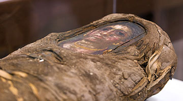 mummy with painted face