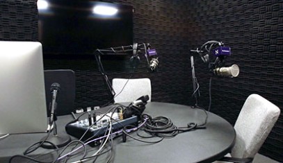 radio studio with microphones and sound dampening