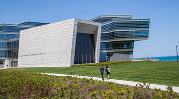 campus building by the lake