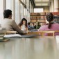 A stock photo of college students in a library