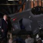 Trump stands in front of some aircraft