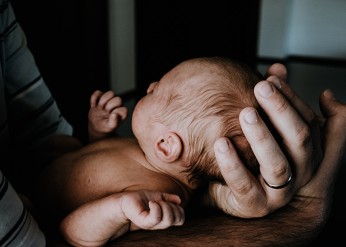 Fathers' influence on breastfeeding and safe sleep
