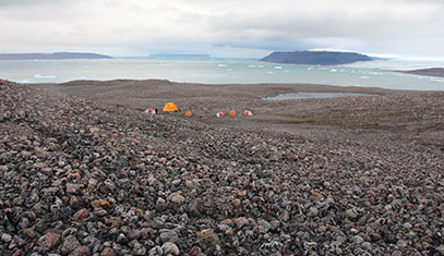 Camp on edge of lake