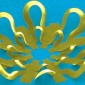 A yellow 3-D printed design sits on a blue background.