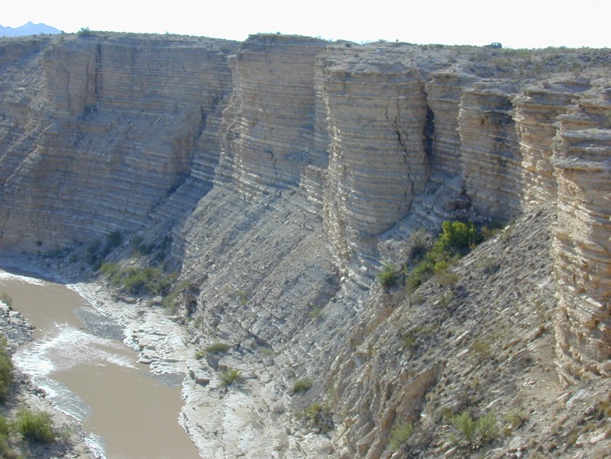 The layer cake of sedimentary rock near Big Bend, Texas, shows the alternating layers of shale and limestone characteristic of the rock laid down at the bottom of a shallow ocean during the late Cretaceous period. 