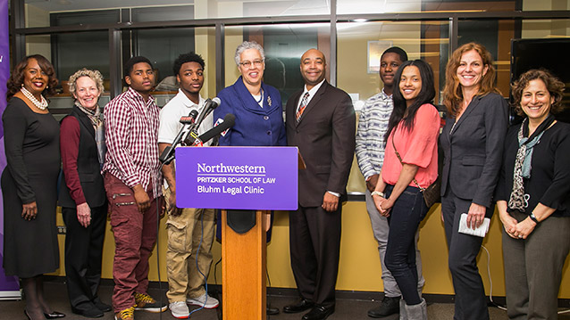 Joined at Northwestern by state lawmakers, impacted youth and juvenile justice advocates, Cook County Board President Toni Preckwinkle (center) announced a proposed bill in Illinois that will make it easier to get juvenile arrest records expunged. Photo by Michael Goss.