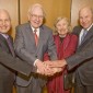 Robert Buffett Elliott, pictured with three others. A 1954 graduate of Northwestern, Elliott donated more the $100 million toward We Will. The Campaign for Northwestern