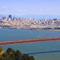 A view of San Francisco from across the bay, with the Golden Gate Bridge in the foreground