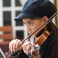 Child playing the violin.