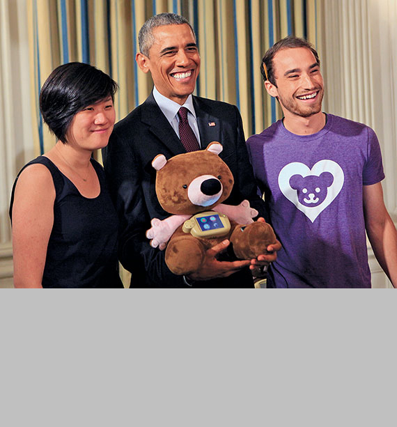 President Obama poses with Sproutel co-founders