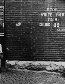 Darryl Cowherd 
"Stop White Police from Killing Us– St. Louis, MO," c. 1966-67
Gelatin Silver Print
Image: 15 x 19 in., mat: 20 x 24 ¼ in., paper 16 x 20 in
© Darryl Cowherd image courtesy of the artist and the Museum of Contemporary Photography
