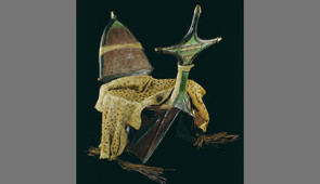 Tuareg camel saddle (tarik or tamzak), Algerian Sahara. Leather, rawhide, wood, parchment or vellum, wool, silk, tin-plated metal, brass-plated metal, iron, copper alloy, cheetah skin,75 x 71 x 46 cm. Peabody Museum of Archaeology and Ethnology, Harvard University, Cambridge, MA, gift of the Estate of Dr. Lloyd Cabot Briggs, 1975, 975-32-50/11927 © President and Fellows of Harvard College, Peabody Museum of Archaeology and Ethnology.