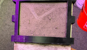 The fuel cell, coated in dirt after being pulled from the ground.