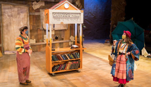 Tomás (Daniel Calderon ’24) discovers the Carnegie Library and the Library Lady (Ruby Gibson’22) in the Wirtz Center for the Performing Arts Imagine U’s filmed “Tomás and the Library Lady. Photo by Justin Barbin.