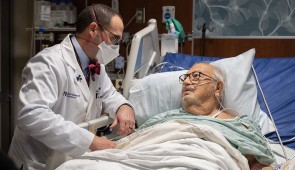 Dr. Brian Garibaldi talks with a patient at Northwestern Medicine.