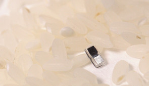 Pacemaker next to rice for scale.