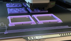 Using the AI-designed blueprint, a 3D printer prints molds for the robots.