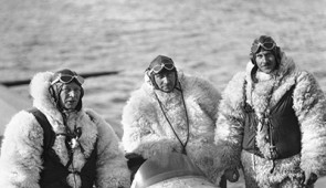 Danish geologist Lauge Koch (center) and colleagues on the open-cockpit Heinkel plane that his team used to survey East Greenland in 1932. Credit: Danish Arctic Institute.