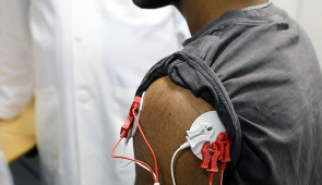 Lab member wears electromyograms in the lab