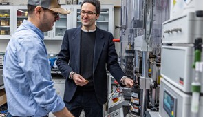 Professor Rotta Loria (right) talks with Andony Landivar Macias, the study's first author, in the laboratory.