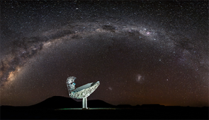 The Milky Way curves around one of MeerKAT’s telescopes in South Africa. 

Credit: SARAO
