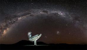The Milky Way curves around one of MeerKAT’s telescopes in South Africa. 

Credit: SARAO