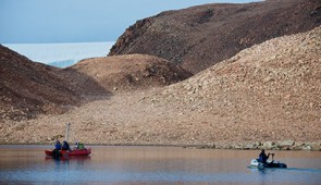 The Northwestern team floats along Wax Lips Lake in northwest Greenland.
Credit: Alex P. Taylor