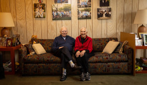 SuperAger Ralph Rehbock sits with his wife in his home. (Credit: Shane Collins, Northwestern University)