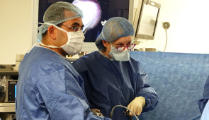 Dr. Shaaban (left) performing surgery.