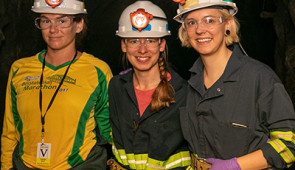 Lead author Lily Momper (left) stands with former graduate student Caitlin Casar (right) and Brittany Kruger (middle)