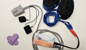 polygraph device next to polygraph system