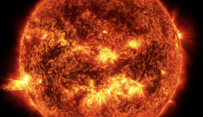 This image from June 20, 2013, at 11:15 p.m. EDT shows the bright light of a solar flare on the left side of the sun and an eruption of solar material shooting through the sun’s atmosphere, called a prominence eruption. Credit: NASA/Goddard/SDO