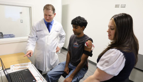Lab member demos video game