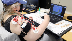 Study participant plays video game