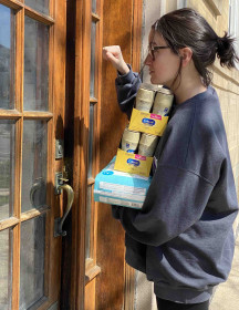 First year Feinberg student Tricia Rae Pendergrast delivers diapers and formula to a new mother who recently delivered a baby.