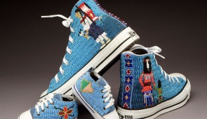 Teri Greeves (Kiowa), My Family's Tennis Shoes, 2003. Beaded Converse All Star high top sneakers, Woman's shoes (each): 15.2 × 8.9 × 26.7 cm and Baby's shoes (each): 7 × 5.1 × 12.1 cm., Cotton, rubber, glass beads, metal, thread,  Collection of School for Advanced Research, SAR.2003-16-1A-D.  Photo by Addison Doty. Courtesy of the School for Advanced Research.

