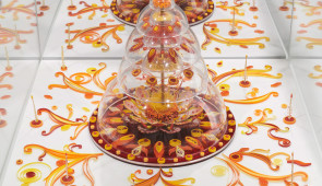 Dario Robleto, "The Computer of Jupiter," 2019.
Various cut and polished seashells, urchin spines, cut and quilled paper, squilla claws, colored powder pigments, colored plastic beads, acrylic domes, brass rod, colored and mirrored Plexiglas, glue, acrylic on wood. 48" x 19" x 19" overall with base and vitrine. Image courtesy of the artist.