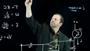 Michael Peshkin is able to face students while teaching with his lightboard.