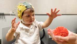 toddler wearing eeg cap