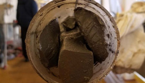 A drilled core of sediment from the ocean.