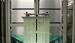 HARP prints vertically, using ultraviolet light to cure liquid resins into hardened plastic.