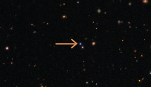 This image shows the cosmic field in which the fast X-ray transient EP 250108a, and the supernova that followed it (blue dot), were detected by Einstein Probe (EP) in early 2025. Using a combination of telescopes, including the International Gemini Observatory, funded in part by the U.S. National Science Foundation and operated by NSF NOIRLab, and the SOAR telescope at Cerro Tololo Inter-American Observatory in Chile, a Program of NSF NOIRLab, a team of astronomers studied the evolving signal of EP 250108a/SN 2025kg to uncover details about its origin. Their analysis reveals that fast X-ray transients can result from the ‘failed’ explosive death of a massive star. An arrow marks the events location.