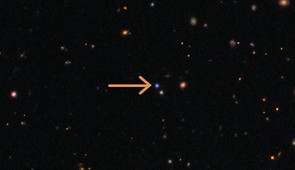 This image shows the cosmic field in which the fast X-ray transient EP 250108a, and the supernova that followed it (blue dot), were detected by Einstein Probe (EP) in early 2025. Using a combination of telescopes, including the International Gemini Observatory, funded in part by the U.S. National Science Foundation and operated by NSF NOIRLab, and the SOAR telescope at Cerro Tololo Inter-American Observatory in Chile, a Program of NSF NOIRLab, a team of astronomers studied the evolving signal of EP 250108a/SN 2025kg to uncover details about its origin. Their analysis reveals that fast X-ray transients can result from the ‘failed’ explosive death of a massive star. An arrow marks the events location.