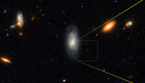 This Gemini North image, superimposed on an image taken with the Hubble Space Telescope, shows the telltale near-infrared afterglow of a kilonova produced by a long GRB (GRB 211211A). This discovery challenges the prevailing theory that long GRBs exclusively come from supernovae, the end-of-life explosions of massive stars. Credit: International Gemini Observatory/NOIRLab/NSF/AURA/M. Zamani; NASA/ESA