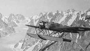 A biplane flies over Greenland. Credit: The Danish Agency for Datasupply and Infrastructure