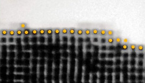 Liquid-phase TEM video of layer-by-layer growth of a crystal with smooth surface from gold concave nanocubes. Surface particles on the growing crystal are tracked (center positions overlaid with yellow dots).