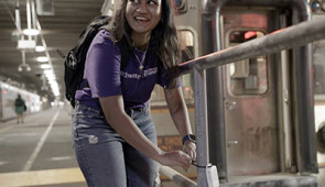 Anjali Naidu Thota, a Ph.D. student in Rotta Loria's lab, affixes a temperature sensor to a pipe in a basement beneath the Chicago Loop.