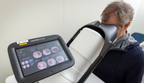 A simulated study participant gets a retinal scan at the Longevity Lab (Photo by Shane Collins, Northwestern University)