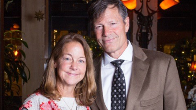 Two people, a man and a woman, pose for a picture.