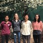 Four women pose for a picture